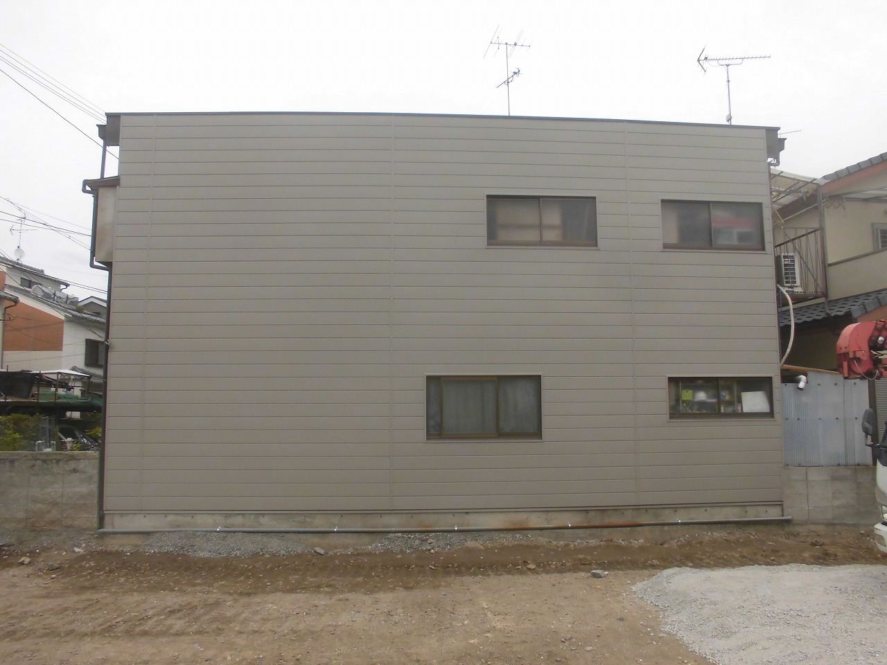 京都府向日市戸建て　外壁モルタル壁からサイディング工事